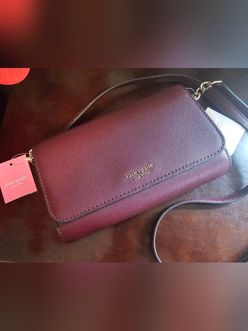 Kate Spade Burgundy Saffiano Crossbody Wallet with Gold Logo